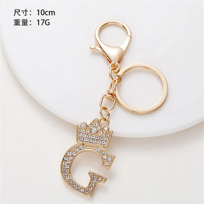 1 gab. Sieviešu atslēgu piekariņš 26 Angļu alfabēta mirdzums, izdobts kulons, radoši somas rotājumi, aksesuāri, automašīnu atslēgu piekariņi