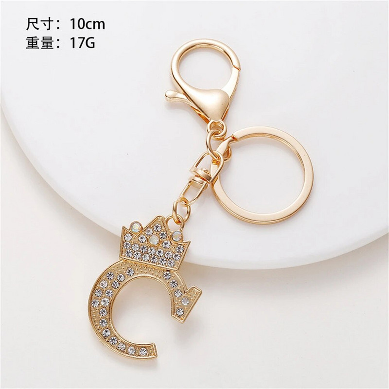 1 gab. Sieviešu atslēgu piekariņš 26 Angļu alfabēta mirdzums, izdobts kulons, radoši somas rotājumi, aksesuāri, automašīnu atslēgu piekariņi