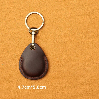 Ādas piekļuves karšu vāciņš Atslēgu piekariņš Kabatas autobusa karšu atslēgu piekariņi Mobilā tālruņa soma Automašīnas kulons atslēgu piekariņš Dāvanu aksesuāri Atslēgu piekariņš