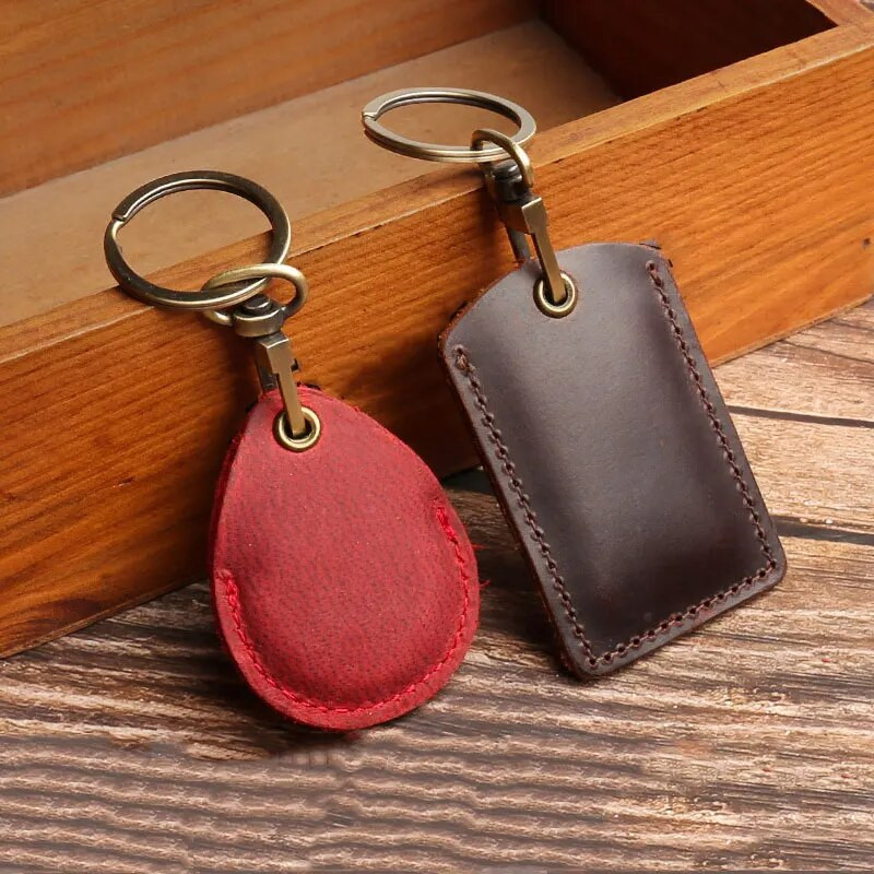 Ādas piekļuves karšu vāciņš Atslēgu piekariņš Kabatas autobusa karšu atslēgu piekariņi Mobilā tālruņa soma Automašīnas kulons atslēgu piekariņš Dāvanu aksesuāri Atslēgu piekariņš