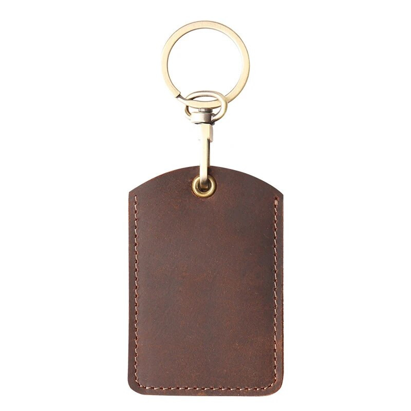 Ādas piekļuves karšu vāciņš Atslēgu piekariņš Kabatas autobusa karšu atslēgu piekariņi Mobilā tālruņa soma Automašīnas kulons atslēgu piekariņš Dāvanu aksesuāri Atslēgu piekariņš