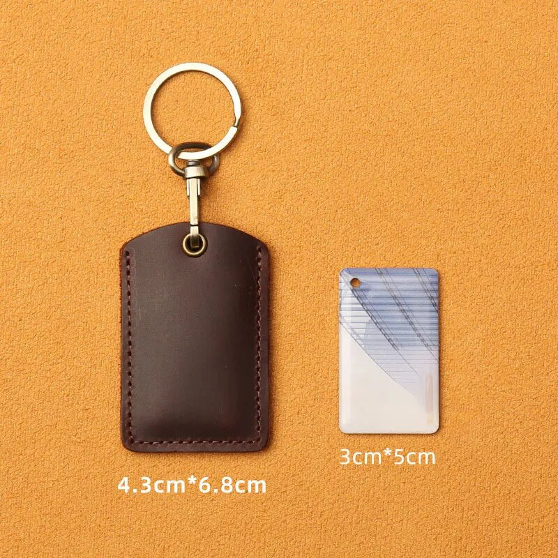 Ādas piekļuves karšu vāciņš Atslēgu piekariņš Kabatas autobusa karšu atslēgu piekariņi Mobilā tālruņa soma Automašīnas kulons atslēgu piekariņš Dāvanu aksesuāri Atslēgu piekariņš