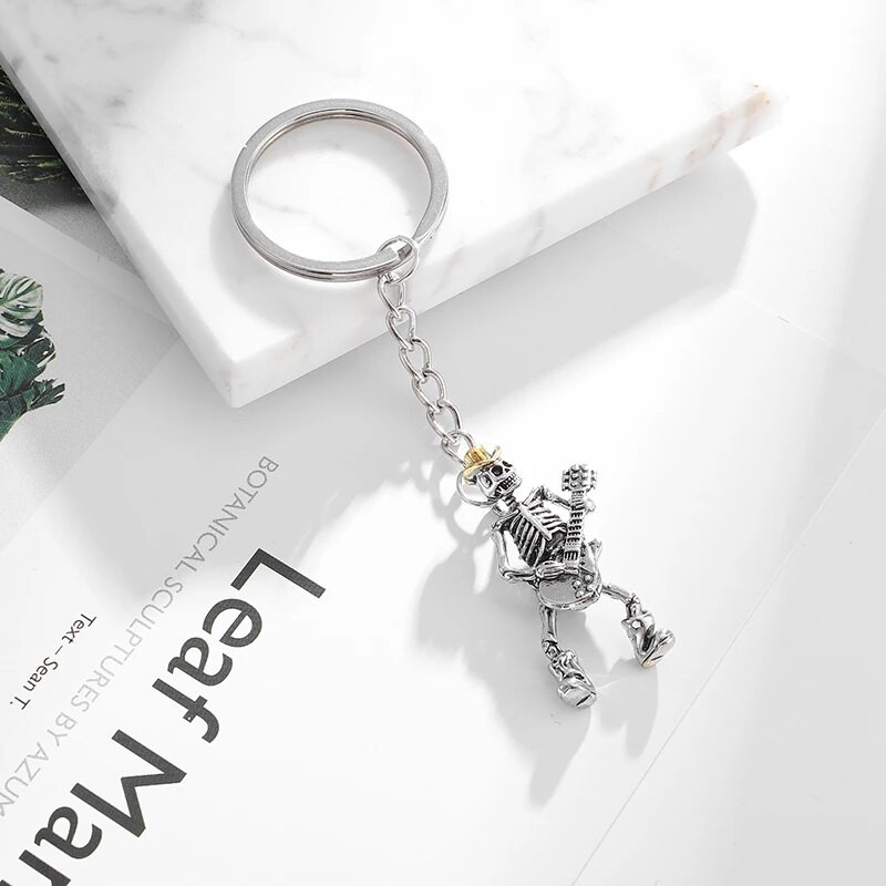 Retro hiphopa ģitāras galvaskausa atslēgu piekariņš vīriešu un sieviešu motociklu kulonu atslēgu piekariņu aksesuāri panku tendences dāvana