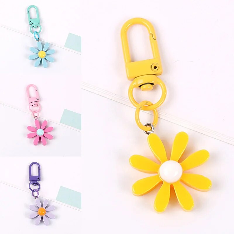 Modes margrietiņa atslēgu piekariņš korejiešu stila ziedu atslēgu piekariņš meitenei jauks atslēgu piekariņš austiņu vāciņš somiņa mugursoma rotājumi aksesuāri