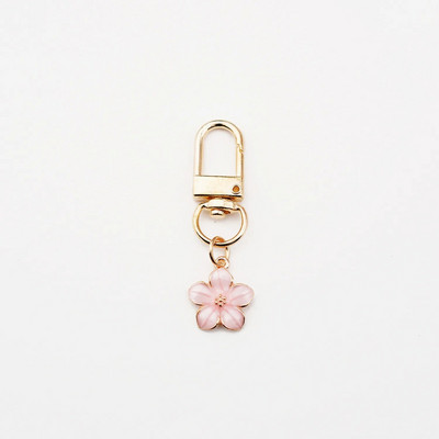 Skaists Sakura ziedu atslēgu piekariņš, emalja violets zaļš rozā balts melns sieviešu atslēgu piekariņš