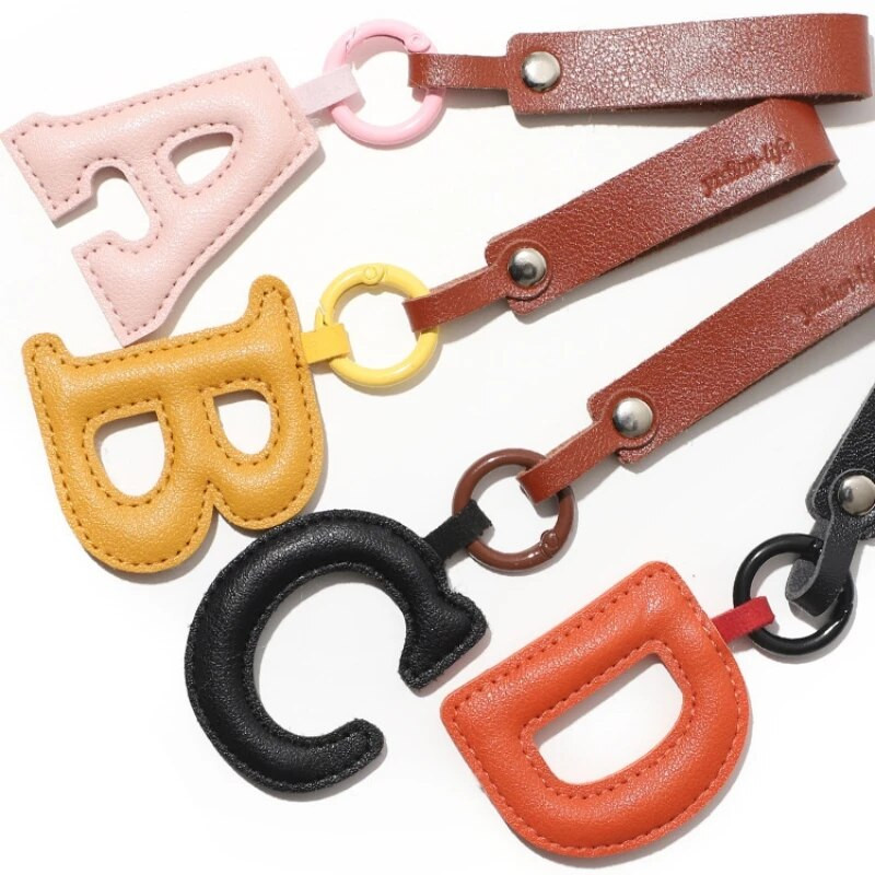 HOT Creative PU 26 burtu atslēgu ķēdes alfabēta burtu automašīnas atslēgu aksesuāri biznesa atslēgu turētājs sieviešu somas kulonu atslēgu piekariņa dekorēšana