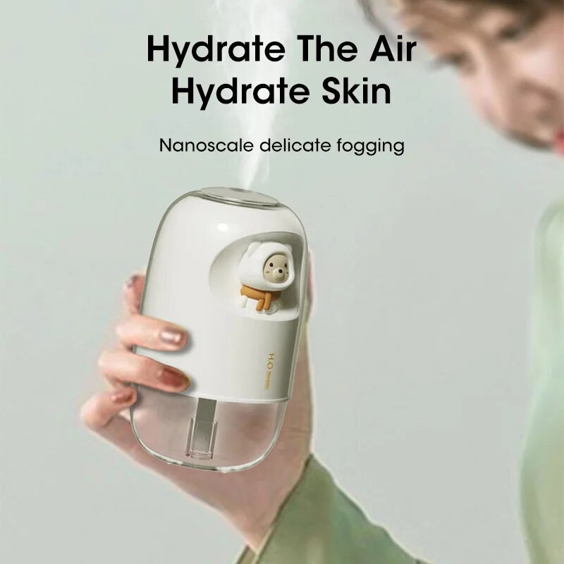 Mitrinātājs Mini gaisa mitrinātājs USB mājas atmosfēra, gaišs, kluss un pārnēsājams galddators, mazs aromterapijas jauks mājdzīvnieks