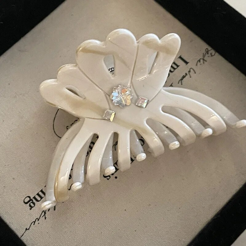 Γαλλικό εκλεκτό υψηλής ποιότητας κλιπ κούμπωμα λουλουδιών με θηλυκό στυλ Απλό και ευέλικτο μισοδεμένο κλιπ καρχαρία αξεσουάρ μαλλιών