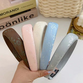 Jauna ķīniešu ziedu sūkļa galvas saite ar augstu galvaskausu ar platu malu galvassegu ar platu malu.