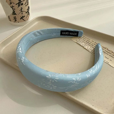 Jauna ķīniešu ziedu sūkļa galvas saite ar augstu galvaskausu ar platu malu galvassegu ar platu malu.