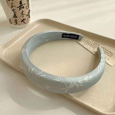 Jauna ķīniešu ziedu sūkļa galvas saite ar augstu galvaskausu ar platu malu galvassegu ar platu malu.