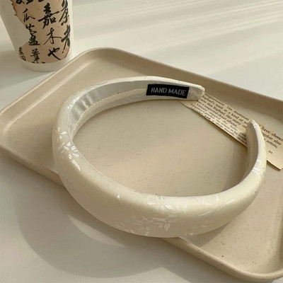 Jauna ķīniešu ziedu sūkļa galvas saite ar augstu galvaskausu ar platu malu galvassegu ar platu malu.