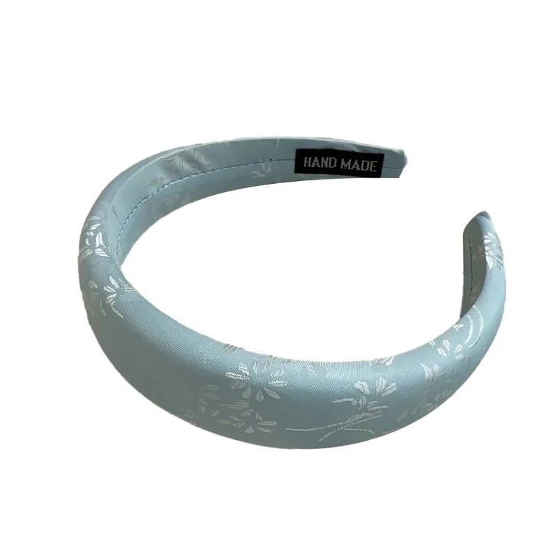 Jauna ķīniešu ziedu sūkļa galvas saite ar augstu galvaskausu ar platu malu galvassegu ar platu malu.