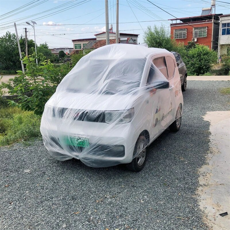 Caurspīdīgs automašīnas pārsegs Universal Car Cover Ūdensizturīgs Putekļu necaurlaidīgs Vienreizējās lietošanas automašīnas Pārvalki Izmērs M-XL Caurspīdīgi plastmasas automašīnu pārsegi