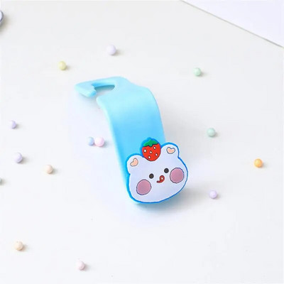 Karikatūra Automašīnas sēdekļa pakaramais Āķis Maska Somas aksesuāri Turētājs Āķis Bez štancēšanas Vietu taupošs automašīnas organizatora statīvs Somas statīvs