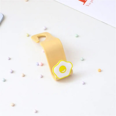 Karikatūra Automašīnas sēdekļa pakaramais Āķis Maska Somas aksesuāri Turētājs Āķis Bez štancēšanas Vietu taupošs automašīnas organizatora statīvs Somas statīvs