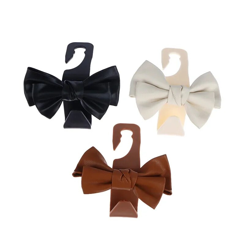 Automašīnas sēdekļa atzveltnes āķis Bowknot glabāšanas āķis PU ādas modes soma Daudzfunkcionālas dažādas lietas muguras glabāšanas āķis interjera aksesuāri