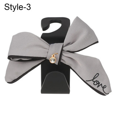 Daudzfunkcionālas glabāšanas priekšgala āķis automašīnas sēdekļa atzveltnes āķim Dažādi jauki aizmugurējā sēdekļa novietošanas rīki Salona piederumi