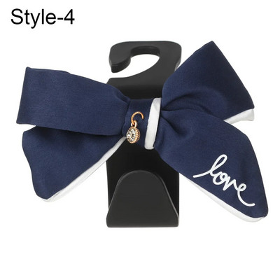 Daudzfunkcionālas glabāšanas priekšgala āķis automašīnas sēdekļa atzveltnes āķim Dažādi jauki aizmugurējā sēdekļa novietošanas rīki Salona piederumi