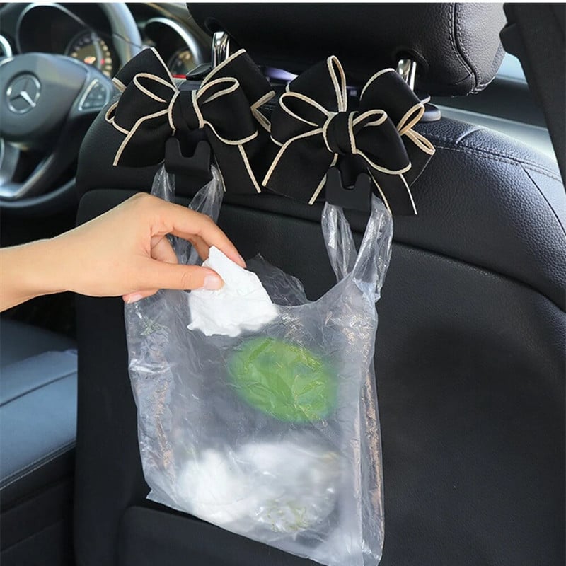 Daudzfunkcionālas glabāšanas priekšgala āķis automašīnas sēdekļa atzveltnes āķim Dažādi jauki aizmugurējā sēdekļa novietošanas rīki Salona piederumi