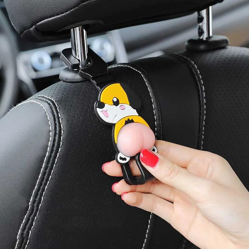 2gab. Automašīnas sēdekļa atzveltnes karikatūras āķi ar jauku dupša spilvenu iekšpuses organizators galvas balsta iekarināmais turētājs rokassomu uzglabāšanas sēdekļu āķis