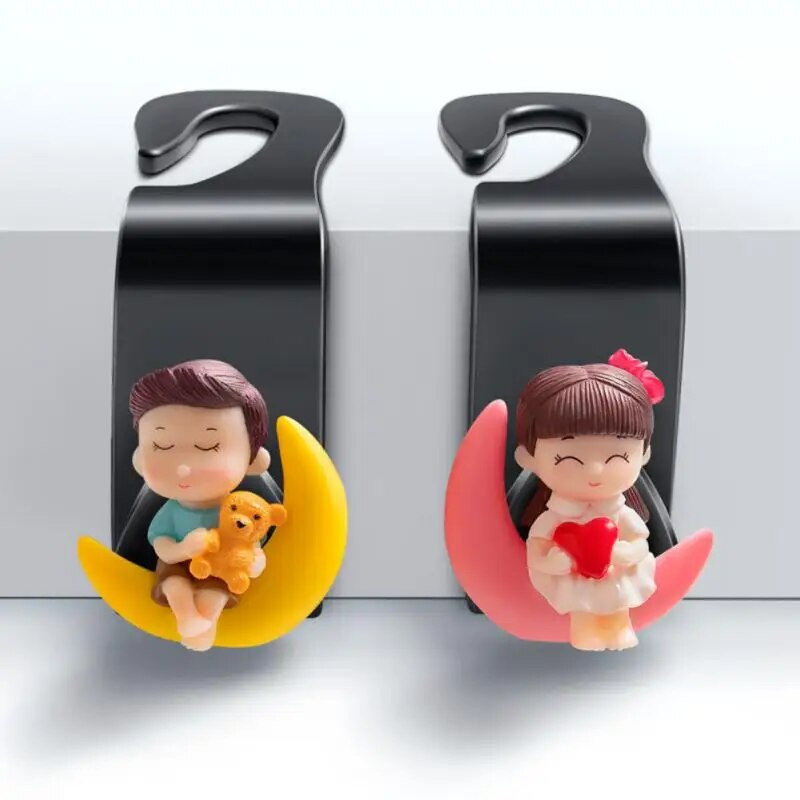 Universāls automašīnas galvas balsta āķis Cute Coup Auto pakaramais sēdekļa aizmugurējais pakaramais Uzglabāšanas āķis Auduma glabāšanas turētājs Clip Auto piederumi