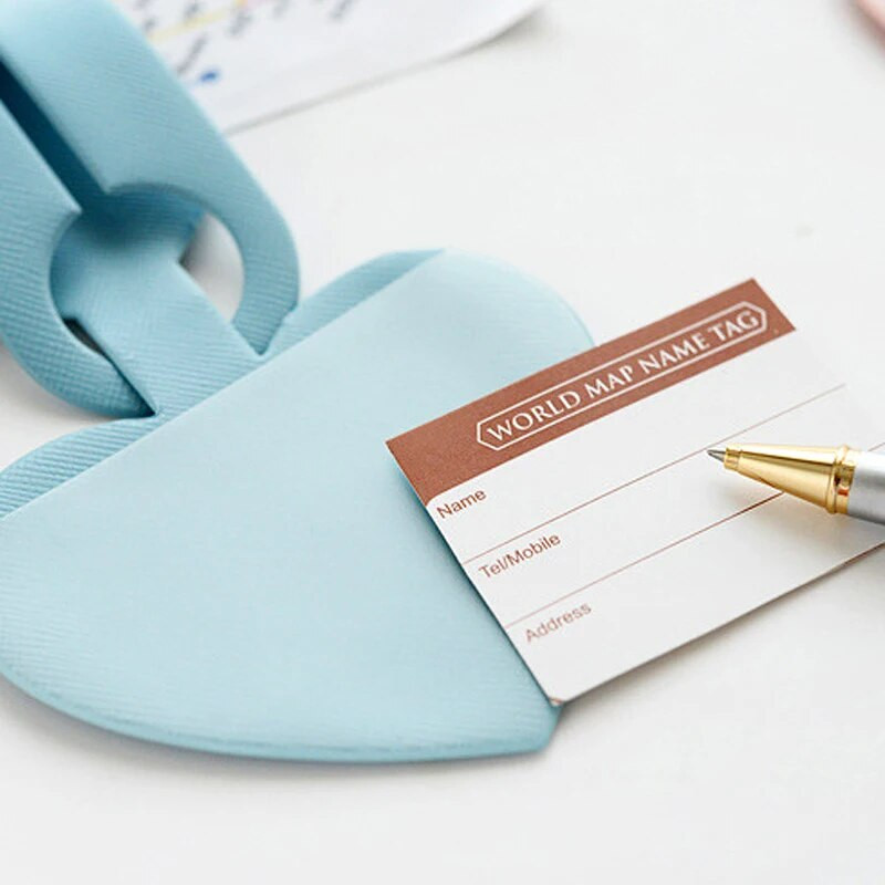 Vienkārša sirds formas ādas bagāžas zīme sievietēm ceļojumu čemodāna ID adreses turētājs meitenēm bagāžas birkas Iekāpšanas soma Pārnēsājama etiķete