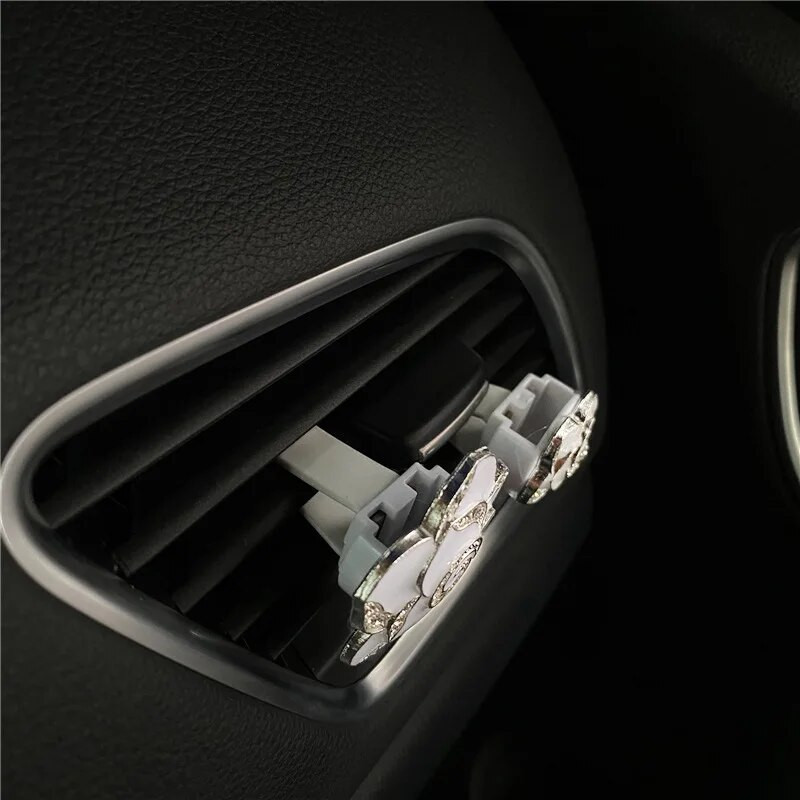 Metāla krāsas Camellia automašīnu smaržu klipsis sievietēm gaisa kondicionētājs Outlet smaržu klips Camellia automašīnu salona aksesuāri