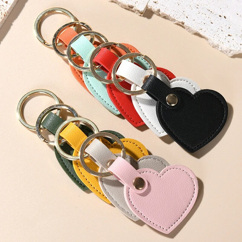 Nahast südamekujuline võtmehoidja Mood Nahast südamekujuline võtmehoidja Naiste autovõtmehoidja Kodune Võtmehoidja võlukott Autoripats Kingitus