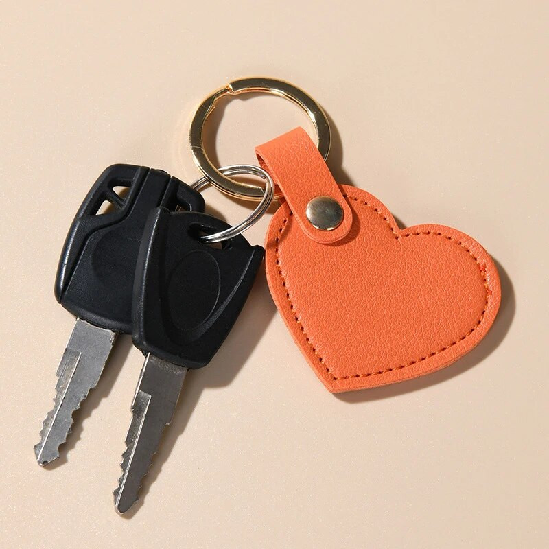 Nahast südamekujuline võtmehoidja Mood Nahast südamekujuline võtmehoidja Naiste autovõtmehoidja Kodune Võtmehoidja võlukott Autoripats Kingitus