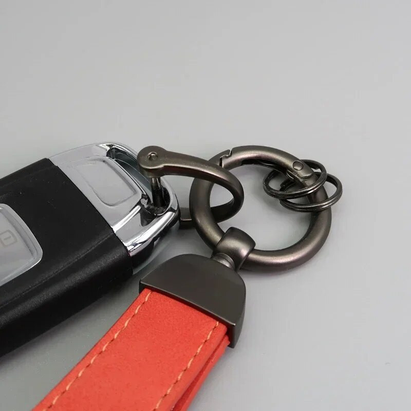 Vairākas krāsas Luksusa auto atslēgu piekariņš īstas ādas atslēgu piekariņš Tīras krāsas sprādzes Automašīnas atslēgu piekariņi Automašīnu aksesuāri Dāvanu aksesuāri
