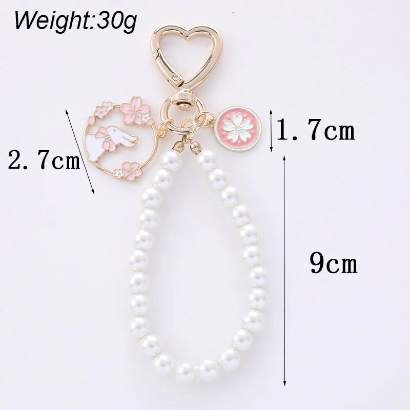Magusa roosa kirsiõie fänn Jänese lint pärliga võtmehoidja naiste loominguline südame võtmehoidja kott ripats ehted tüdrukutele
