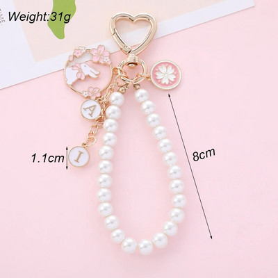 Korejas saldo ķiršu ziedu trušu atslēgu piekariņš sievietēm radošs pērļu atslēgu piekariņš rokassomu austiņu futrālis kulonu rotaslietas