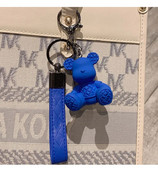 Kreatív bambusz szőtt medve autós kulcstartó medál aranyos rajzfilm ülő medve autós kulcstartó dekoráció ajándék nagykereskedelem