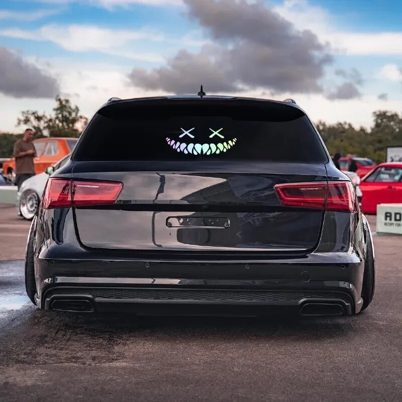 Démon mosolygó arcú autómatricák hátsó szélvédőhöz, hideg autó karosszériához vízálló dekorációhoz, bakelit matricák autóablakokhoz