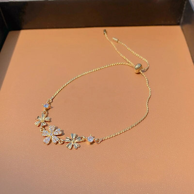 Modne delikatne narukvice zlatne boje s četiri lista trave za žene Nove korejske podesive narukvice Vjenčani nakit Pokloni za zabavu