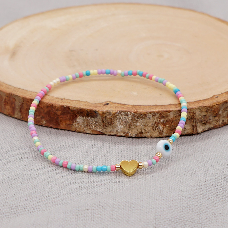 „Go2BoHo“ madingi papuošalai „Boho“ apyrankė, auksinė širdelė, balta glazūruota pikta akis, spalvinga sėklų karoliukais Sėkmės apyrankės moterims 2023 m.