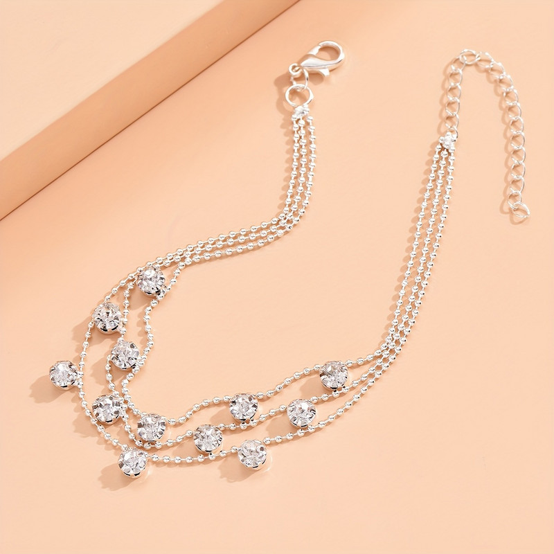 Trīs slāņu luksusa mākslīgo pērļu ķēdes potītes regulējams vara pēdas rotaslietu dekors