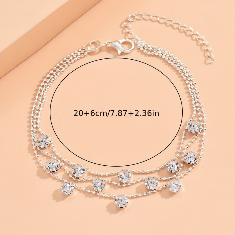 Trīs slāņu luksusa mākslīgo pērļu ķēdes potītes regulējams vara pēdas rotaslietu dekors