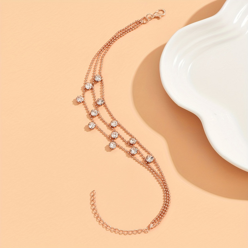 Trīs slāņu luksusa mākslīgo pērļu ķēdes potītes regulējams vara pēdas rotaslietu dekors