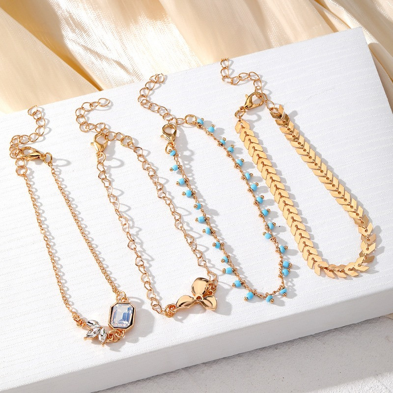 Bohemia zelta krāsas čūskas potītes rokassprādzes komplekts sievietēm ar tauriņu atslēgas slēdzenes šarmu potītes ķēde uz kājas Boho rotaslietas dāvana