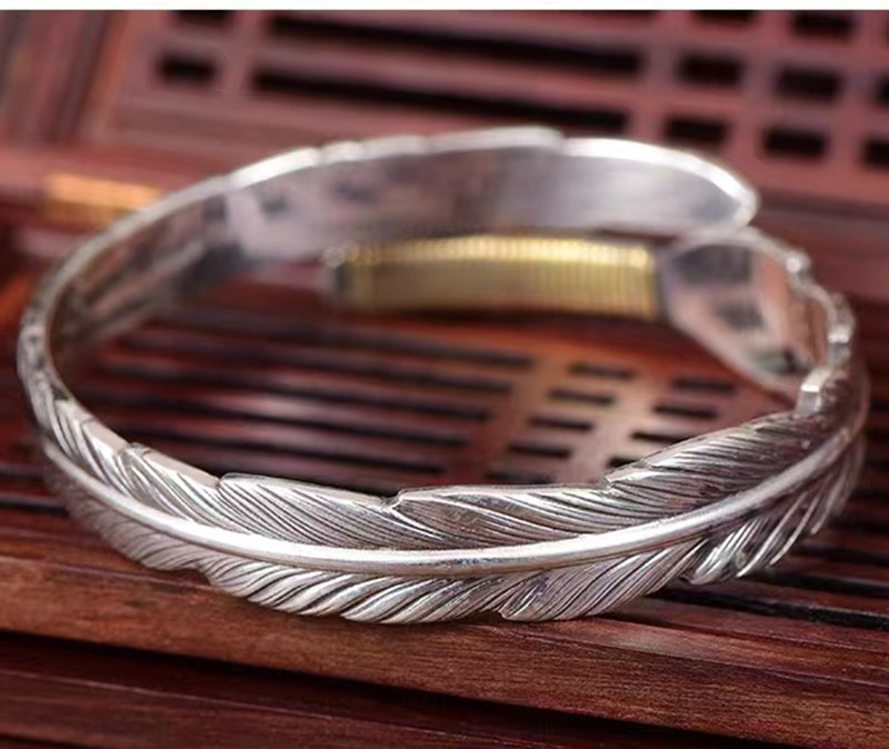 Kūrybinga sidabruota plunksna atvira apyrankė Madingi sparnai rankogaliai apyrankės vyriškos žavios madingos papuošalai jubiliejaus proga