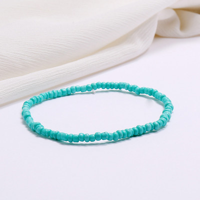 Jaunas, rokām darinātas, fāzēm rotātas potītes rokassprādzes varavīksnes krāsā elastīgas potītes rokassprādzes uz kājas pēdas pludmales rotaslietas