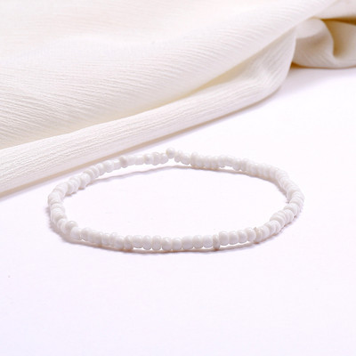 Jaunas, rokām darinātas, fāzēm rotātas potītes rokassprādzes varavīksnes krāsā elastīgas potītes rokassprādzes uz kājas pēdas pludmales rotaslietas