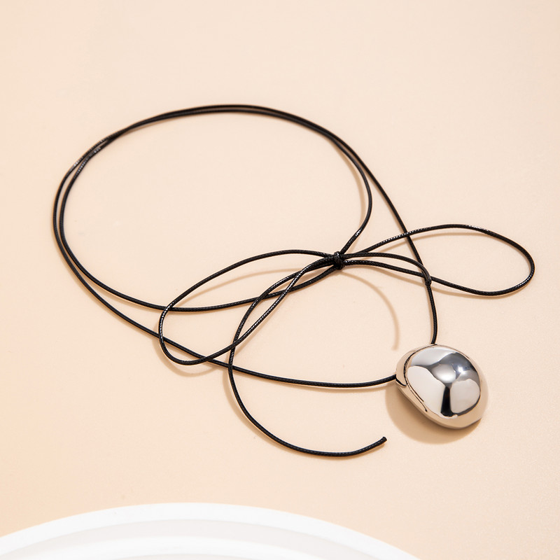 Pikk pitsiline köiskett sileda ellipsoidse ripatsiga kaelakeega naistele Elegantsed naiste aksessuaarid kaelas 2024. aasta moeehted