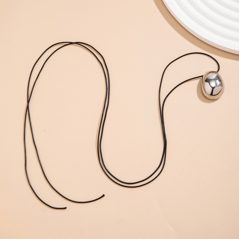 Pikk pitsiline köiskett sileda ellipsoidse ripatsiga kaelakeega naistele Elegantsed naiste aksessuaarid kaelas 2024. aasta moeehted