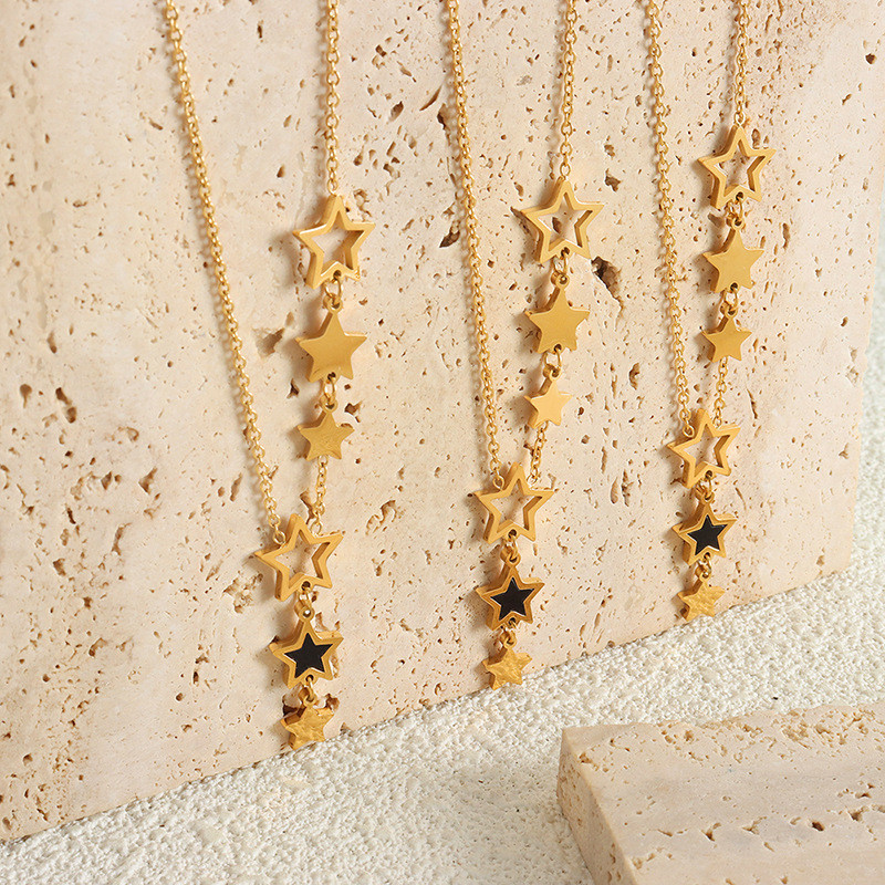 Jaunums Zvaigžņu kulonu kaklarotā sievietēm, nerūsējošā tērauda apzeltīta ķēde, melna akrila modes rotaslietas draudzenes dāvanu vairumtirdzniecība