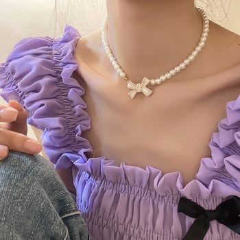 Тенденция за бижута за сватбено тържество Перлен лък Висулка Колье Колие за жени Елегантна бяла имитация на перлена верига Колиета X0201