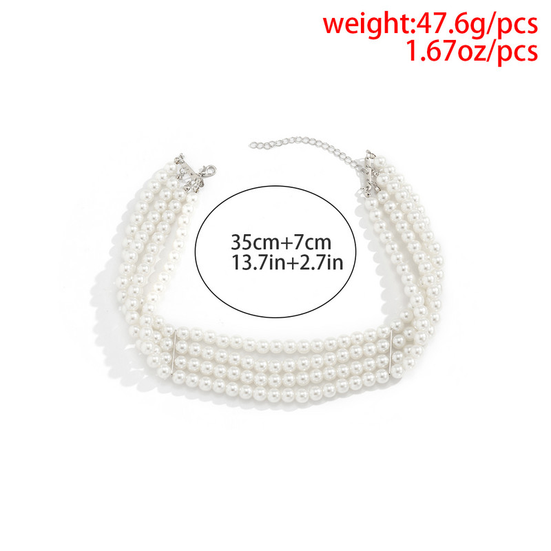 „Ingemark Fashion“ daugiasluoksnis baltas perlų imitacinis kaušelis su metalo skilties fiksavimu, plataus seilinuko karoliai papuošalai žavingoms moterims