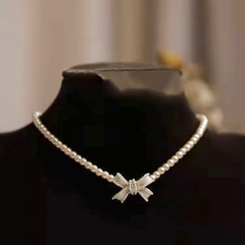 Trend Elegant Jewelry Wedding White Oil Bow Ripats Kaelakee Naistele Moodne Valge imitatsioon Pärli kaelakee N0430